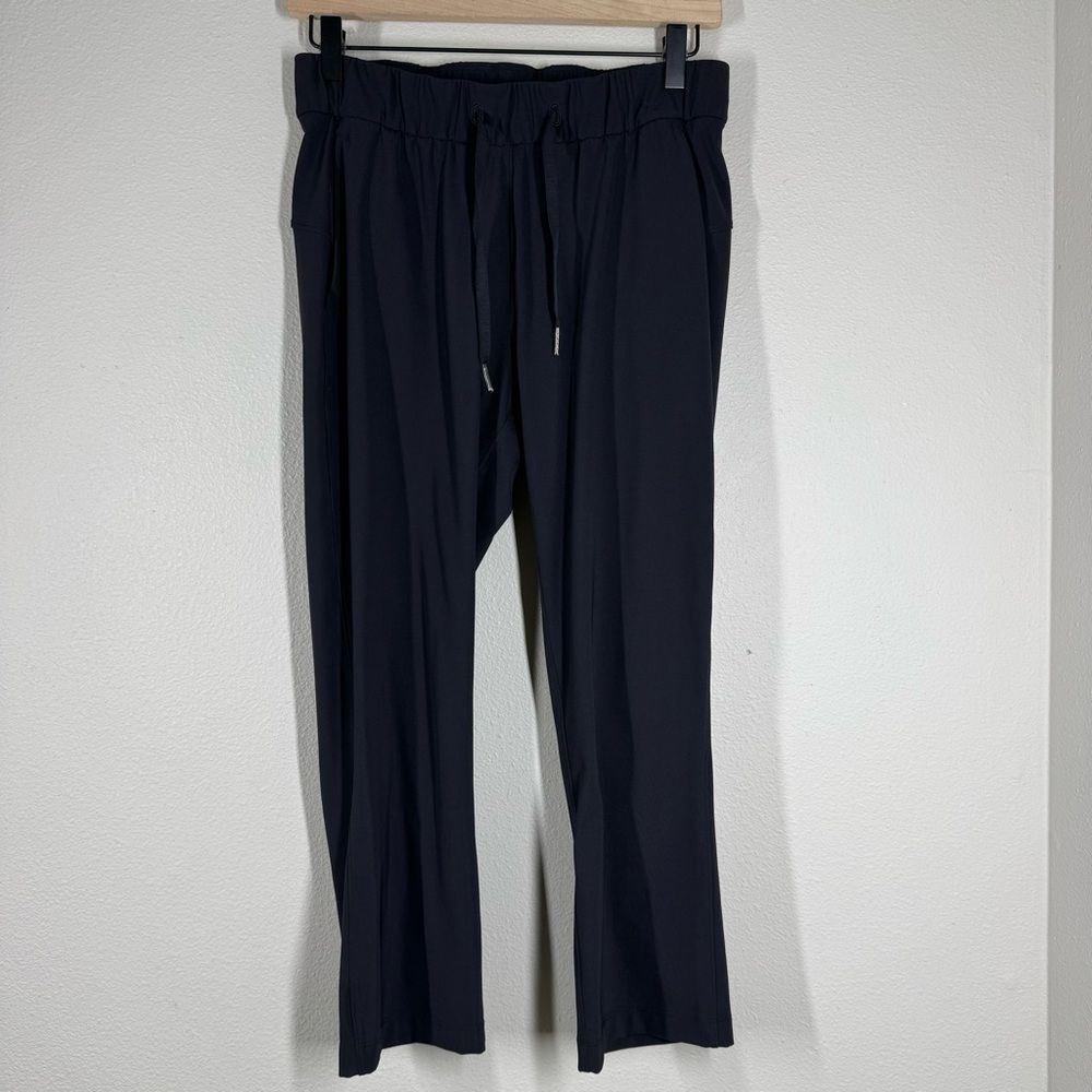 Lululemon On The Fly Crop 23" Black Size 4 Drawstring Pocket Travel W6AV6S